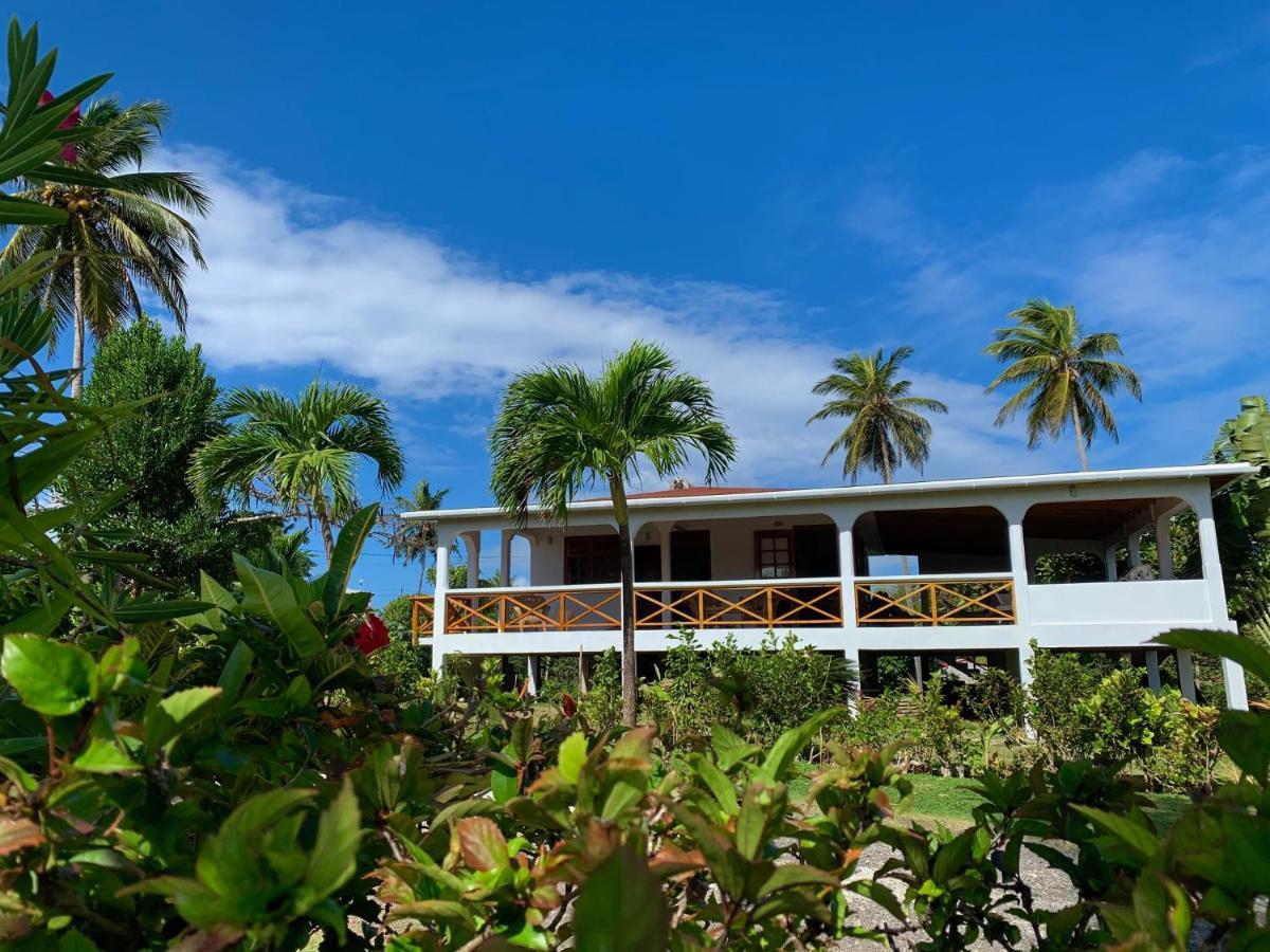 Sea Cliff Eco-Cottages & Gin Distillery Calibishie 外观 照片